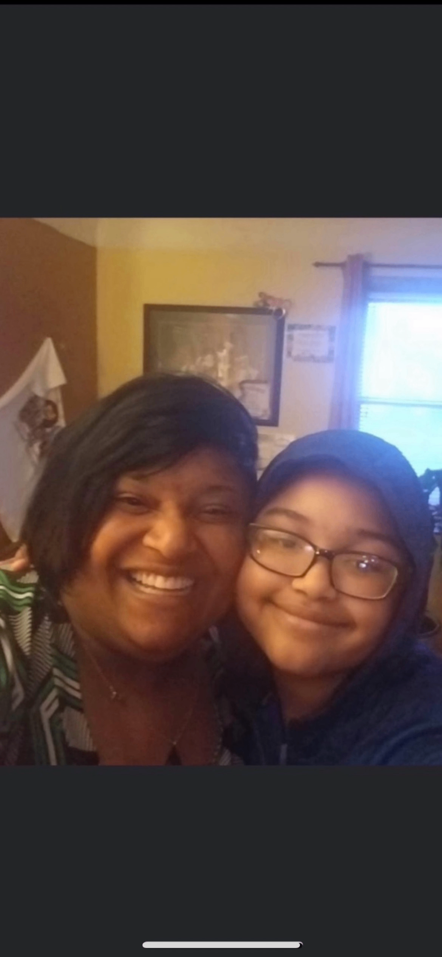 Angelique A. King with a loved one — family at the heart of Earnie's Light